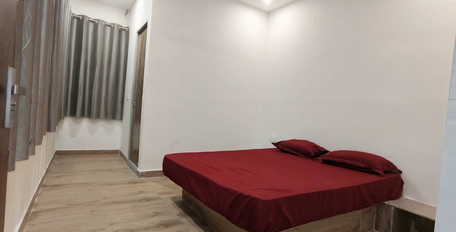 AC guest room at Aamantran Greens Dhanbad